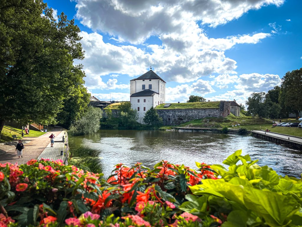 Flower and Nyköping castle in summer time